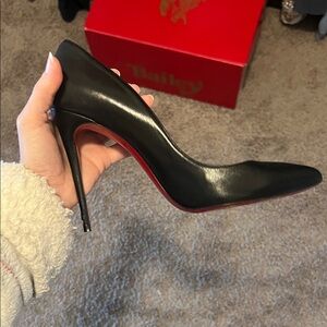 Classic Louboutin red bottoms. Size 40